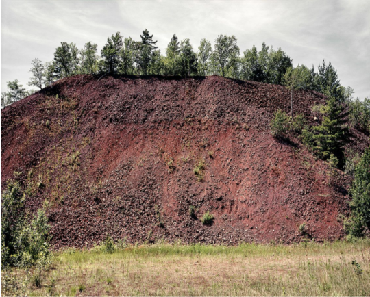 Dirt Hill with trees: photo titled Overburden by Chris Mortenson
