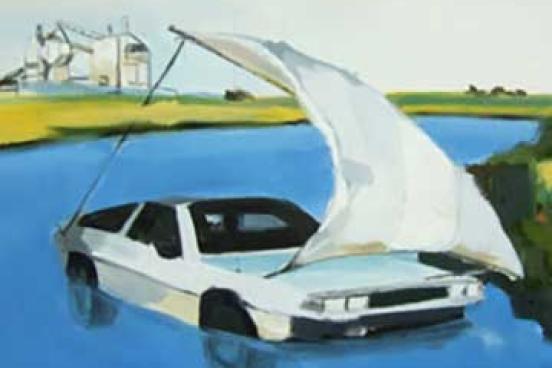 Car floating on water with a sail attached, resembling a boat